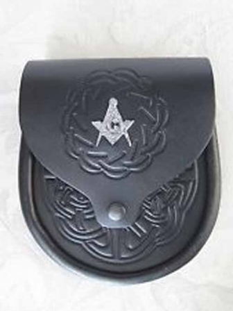 Celtic knot embossed leather sporran features a MASONIC badge on the flap.  Snap closure