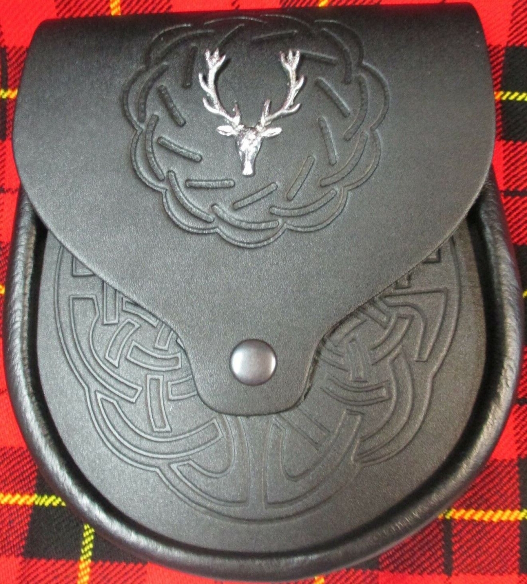 Black Celtic Knot embossed leather Sporran features a SCOTTISH STAG badge on the flap.