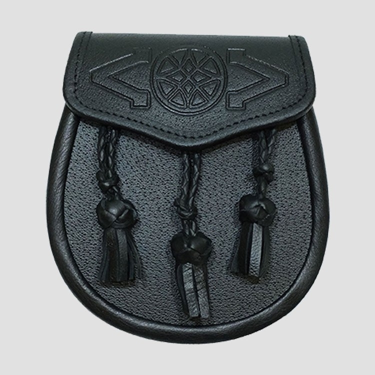 Sporran is black grained leather with leather tassels with Inverted (V)s and Celtic design embossed 