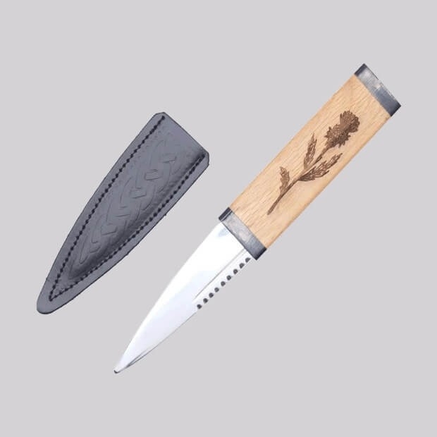 Oak sgian dubh with a thistle design and stainless steel blade 