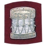 Drum Badge Silver Bullion on Red