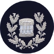 Thistle Wreathed Drum Major Badge Silver Bullion on Blue